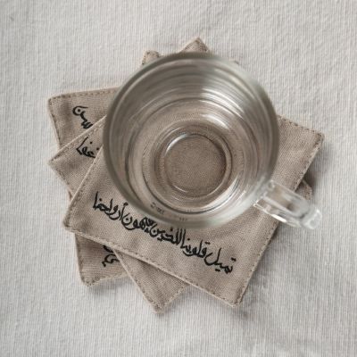 قاعدة أكواب قماشية